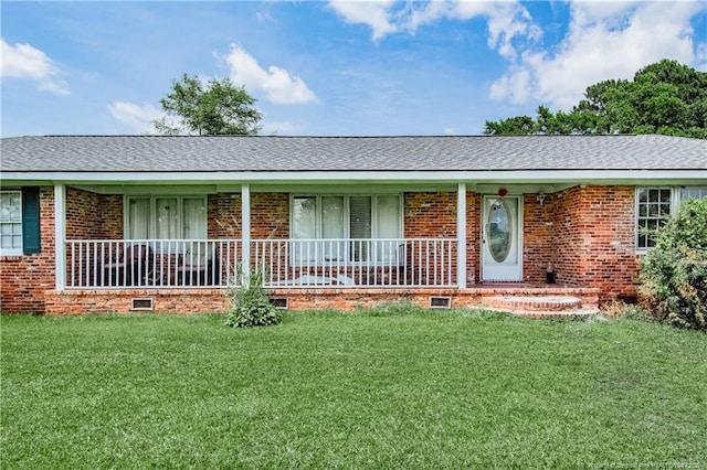 11821 N NC Highway 41, Lumberton, NC 28358 - ranch-style home with brick siding, crawl space, covered porch, and a front yard