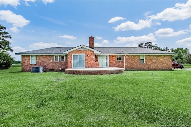 11821 N NC Highway 41, Lumberton, NC 28358 - rear view of property featuring a chimney, a lawn, and brick siding