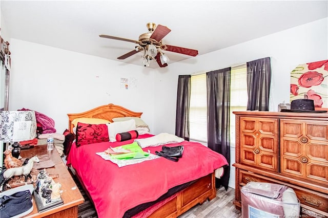 11821 N NC Highway 41, Lumberton, NC 28358 - bedroom featuring light wood finished floors and ceiling fan