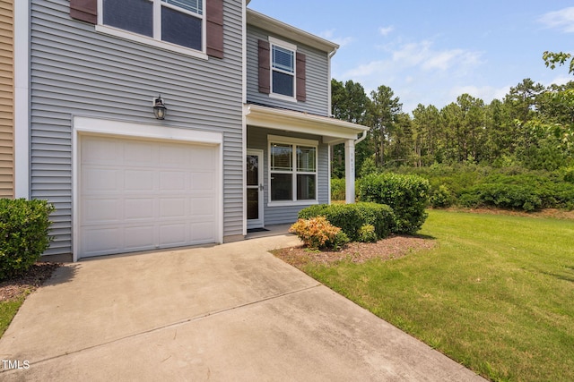 3417 Cardinal Lake Dr, Durham, NC 27704 - view of front of home with a garage, a front lawn, and concrete driveway