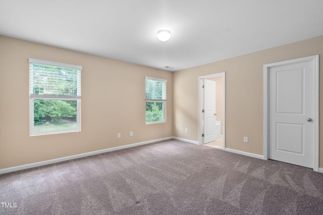 3417 Cardinal Lake Dr, Durham, NC 27704 - unfurnished bedroom with carpet and ensuite bathroom