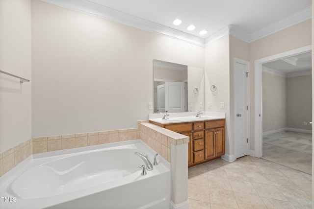 2022 Chandler Village Dr, Graham, NC 27253 - full bath featuring crown molding, a garden tub, double vanity, tile patterned floors, and recessed lighting