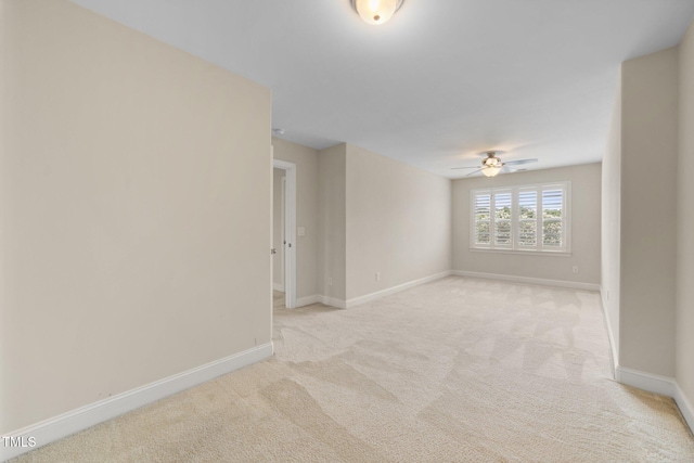 2022 Chandler Village Dr, Graham, NC 27253 - spare room featuring light carpet and a ceiling fan
