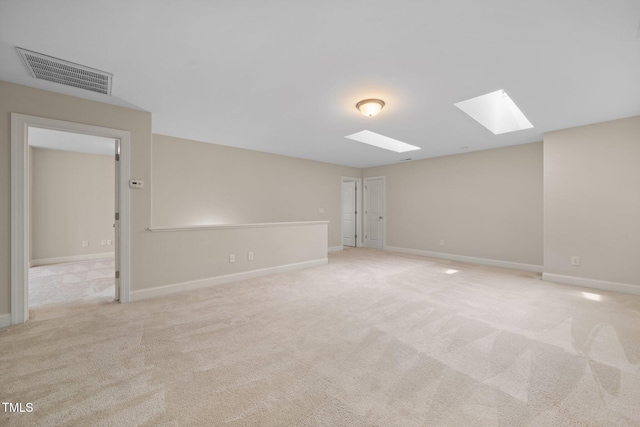 2022 Chandler Village Dr, Graham, NC 27253 - unfurnished room featuring a skylight and carpet