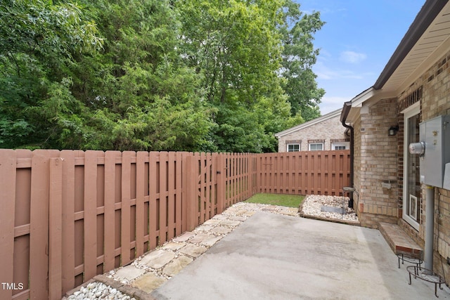 2022 Chandler Village Dr, Graham, NC 27253 - fenced backyard with a patio