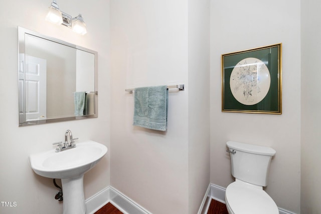 104 Homegate Cir, Apex, NC 27502 - bathroom with toilet and baseboards