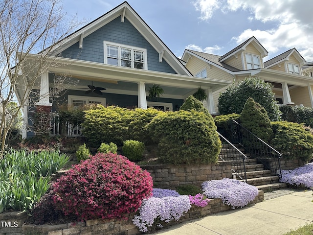104 Homegate Cir, Apex, NC 27502 - craftsman-style house with a ceiling fan, a porch, and stairway