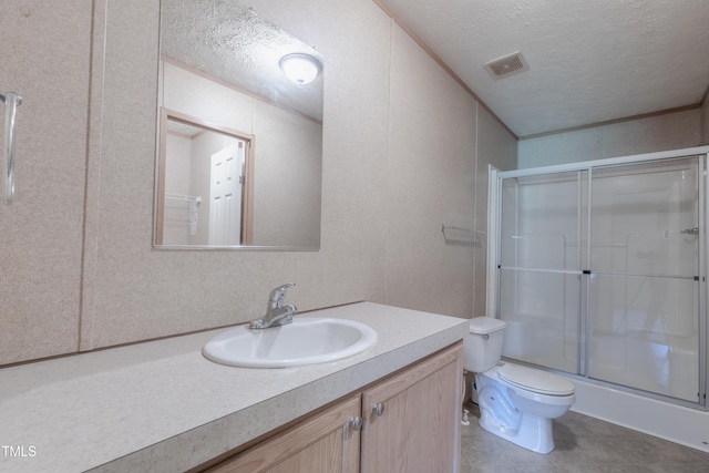 451 Rawls Rd, Aulander, NC 27805 - bathroom with a textured ceiling, a shower with shower door, vanity, and tile patterned floors