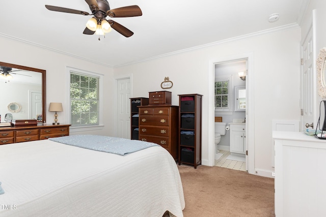 165 Baron Cir, Youngsville, NC 27596 - bedroom featuring light colored carpet, ornamental molding, connected bathroom, and ceiling fan