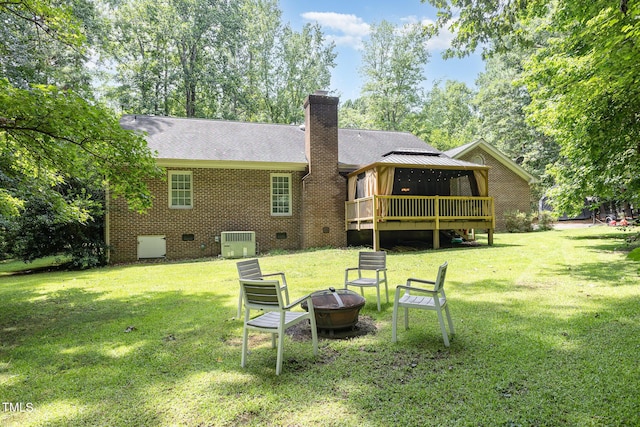 165 Baron Cir, Youngsville, NC 27596 - rear view of house featuring an outdoor fire pit, crawl space, a chimney, and a yard