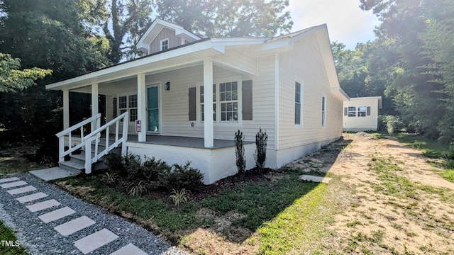 109 N Dunn St, Angier, NC 27501 - view of front of property with a porch