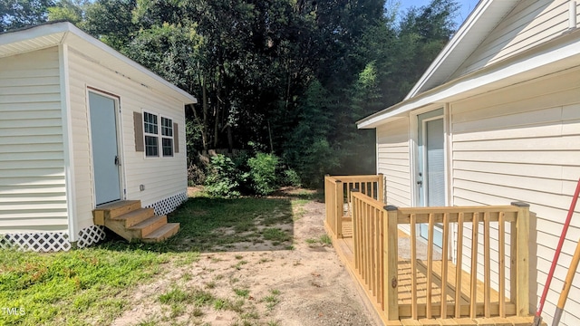109 N Dunn St, Angier, NC 27501 - view of yard with entry steps and a deck