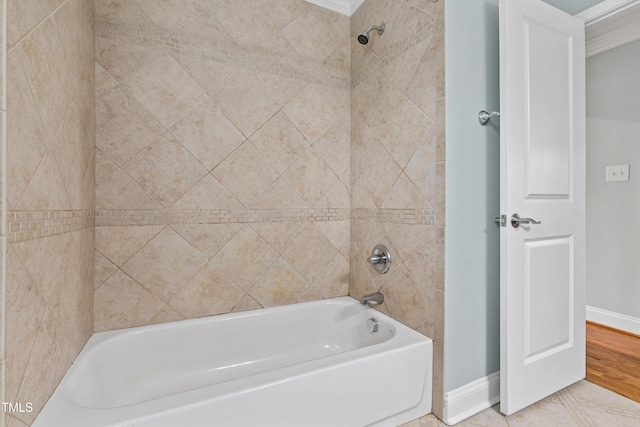625 New Rd, Raleigh, NC 27608 - bathroom with baseboards and washtub / shower combination