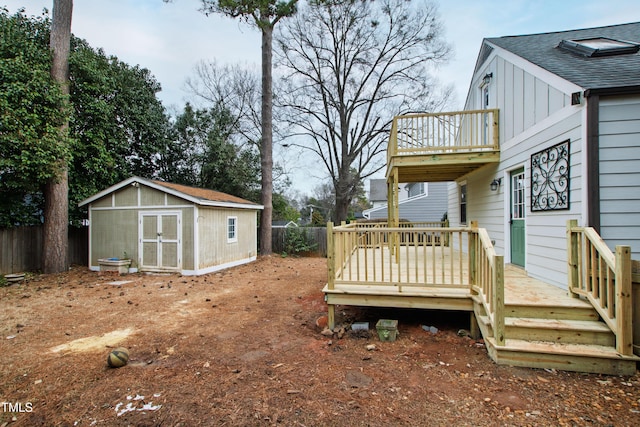 625 New Rd, Raleigh, NC 27608 - fenced backyard with a storage unit, a deck, and a balcony