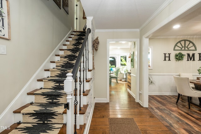 7216 Rabbit Run, Wake Forest, NC 27587 - foyer entrance with wood-type flooring, crown molding, and stairs