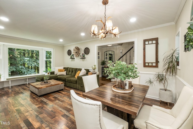7216 Rabbit Run, Wake Forest, NC 27587 - dining area with a chandelier, dark wood-style floors, recessed lighting, ornamental molding, and stairway