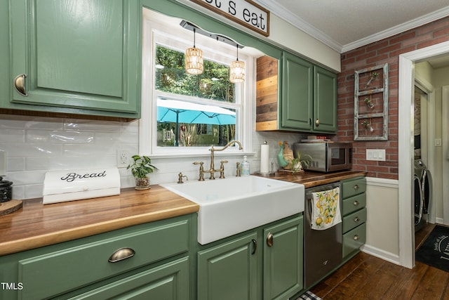 7216 Rabbit Run, Wake Forest, NC 27587 - kitchen featuring green cabinets, appliances with stainless steel finishes, crown molding, independent washer and dryer, and butcher block counters