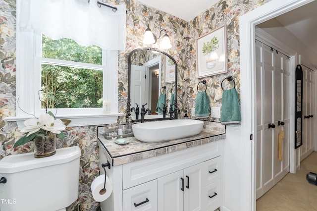 7216 Rabbit Run, Wake Forest, NC 27587 - bathroom with wallpapered walls and vanity