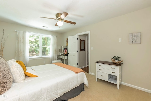7216 Rabbit Run, Wake Forest, NC 27587 - bedroom with light colored carpet and a ceiling fan