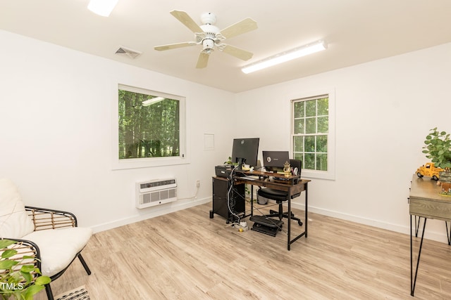 7216 Rabbit Run, Wake Forest, NC 27587 - office space featuring an AC wall unit, light wood-style floors, and ceiling fan