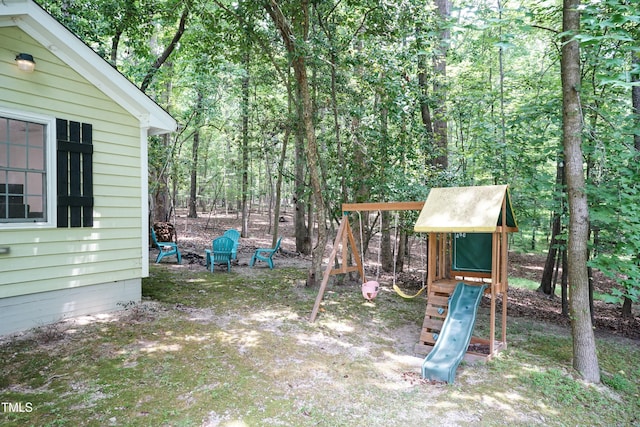 7216 Rabbit Run, Wake Forest, NC 27587 - view of yard with a playground and a view of trees