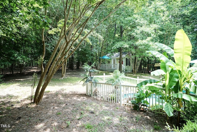 7216 Rabbit Run, Wake Forest, NC 27587 - view of yard with a wooden deck