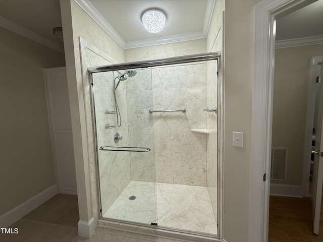 3701 Baron Cooper Pass Unit 303, Raleigh, NC 27612 - full bath with ornamental molding, a shower stall, and wood finished floors