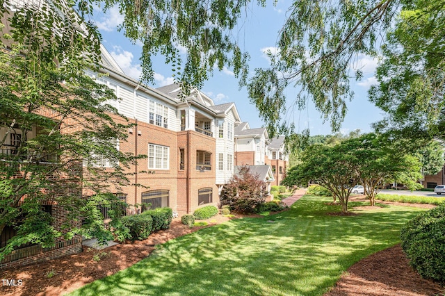 3701 Baron Cooper Pass Unit 303, Raleigh, NC 27612 - view of community featuring a lawn