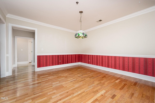 3701 Baron Cooper Pass Unit 303, Raleigh, NC 27612 - empty room with light wood finished floors and ornamental molding
