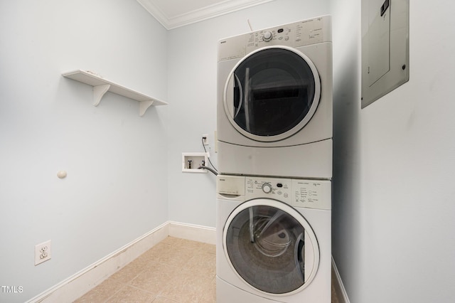 3701 Baron Cooper Pass Unit 303, Raleigh, NC 27612 - laundry area with stacked washer / drying machine, electric panel, ornamental molding, and light tile patterned flooring