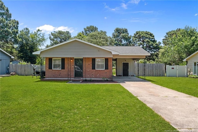 3649 Marcliff Rd, Hope Mills, NC 28348 - view of front of property featuring driveway, brick siding, and a carport