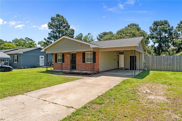 3649 Marcliff Rd, Hope Mills, NC 28348 - ranch-style home featuring driveway, brick siding, and an attached carport