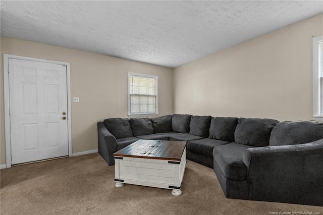 3649 Marcliff Rd, Hope Mills, NC 28348 - carpeted living room featuring a textured ceiling and baseboards