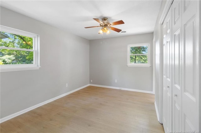 1809 Wendover Dr, Fayetteville, NC 28304 - unfurnished bedroom with light wood-type flooring, a closet, and a ceiling fan