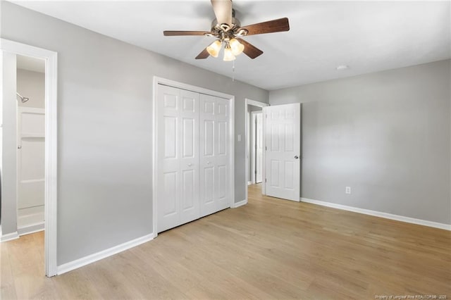 1809 Wendover Dr, Fayetteville, NC 28304 - unfurnished bedroom featuring light wood-style floors, a closet, and a ceiling fan