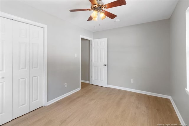 1809 Wendover Dr, Fayetteville, NC 28304 - unfurnished bedroom with light wood-style flooring, a closet, and ceiling fan