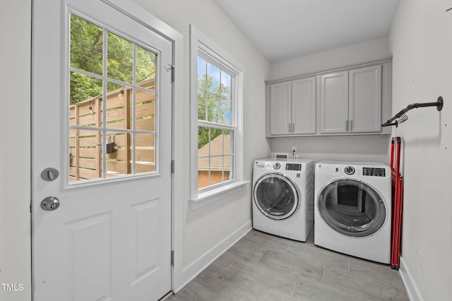 1819 Nixon St, Durham, NC 27707 - washroom featuring cabinet space and separate washer and dryer