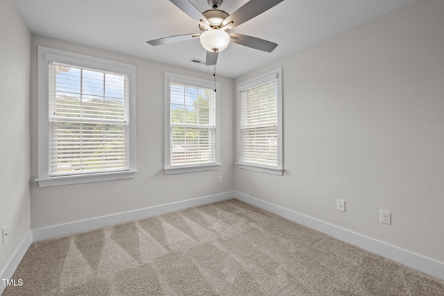 1819 Nixon St, Durham, NC 27707 - carpeted empty room featuring baseboards and ceiling fan