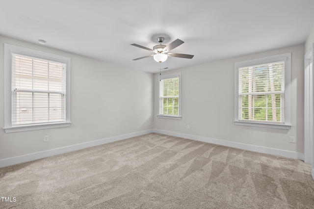 1819 Nixon St, Durham, NC 27707 - carpeted empty room with baseboards and a ceiling fan