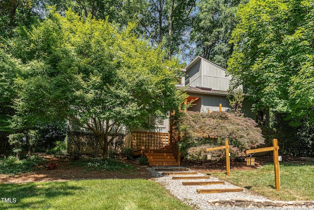 28 Benchmark, Pittsboro, NC 27312 - view of front of property with a front yard and stairway