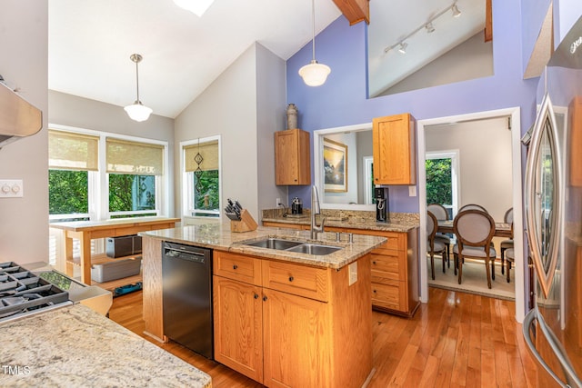 28 Benchmark, Pittsboro, NC 27312 - kitchen featuring black dishwasher, freestanding refrigerator, high vaulted ceiling, light wood-style flooring, and a center island with sink