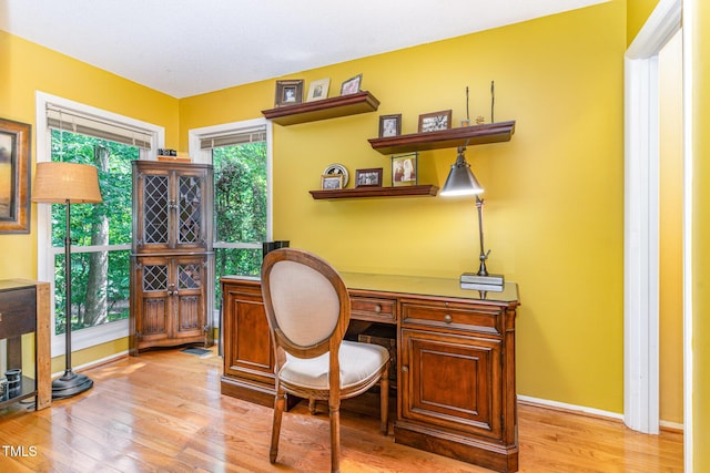 28 Benchmark, Pittsboro, NC 27312 - home office with light wood-style flooring and baseboards
