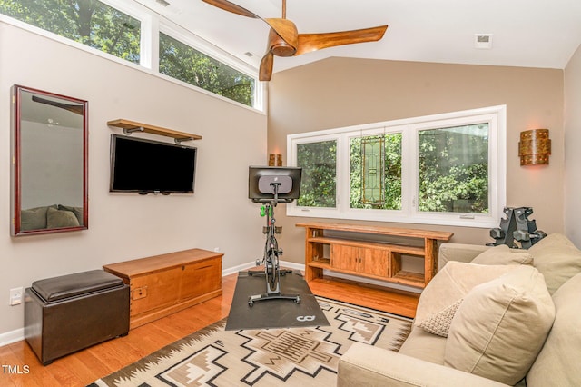 28 Benchmark, Pittsboro, NC 27312 - living room with wood finished floors, a ceiling fan, and high vaulted ceiling
