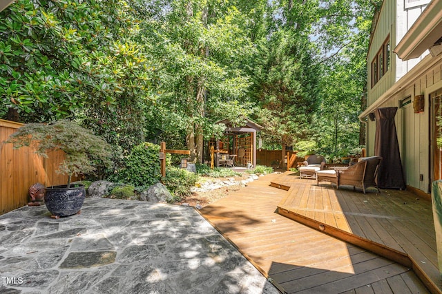 28 Benchmark, Pittsboro, NC 27312 - wooden deck featuring a gazebo, a fenced backyard, and an outdoor hangout area