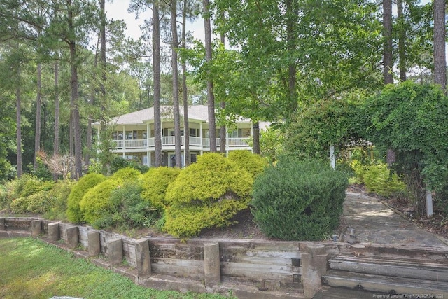 1064 Tresses Ct, Vass, NC 28394 - rear view of house with a balcony