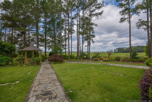1064 Tresses Ct, Vass, NC 28394 - view of grassy yard featuring a gazebo