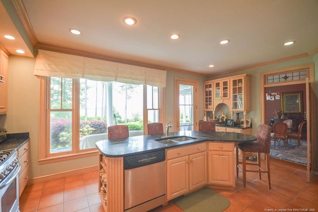 1064 Tresses Ct, Vass, NC 28394 - kitchen with appliances with stainless steel finishes, crown molding, recessed lighting, glass insert cabinets, and a kitchen island with sink