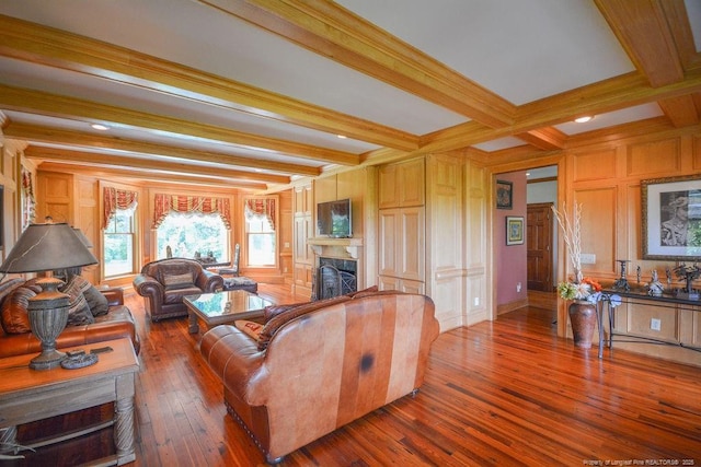 1064 Tresses Ct, Vass, NC 28394 - living room featuring a fireplace, beamed ceiling, hardwood / wood-style flooring, and crown molding