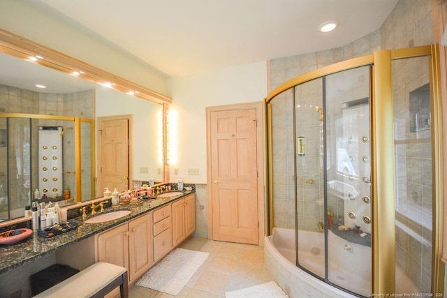 1064 Tresses Ct, Vass, NC 28394 - bathroom with tile walls, a tile shower, a tub with jets, double vanity, and tile patterned flooring