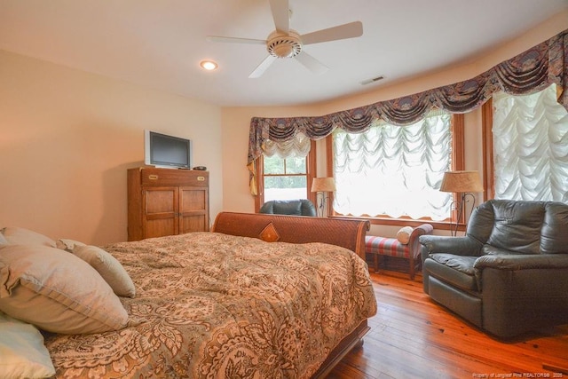 1064 Tresses Ct, Vass, NC 28394 - bedroom with hardwood / wood-style floors, recessed lighting, and ceiling fan
